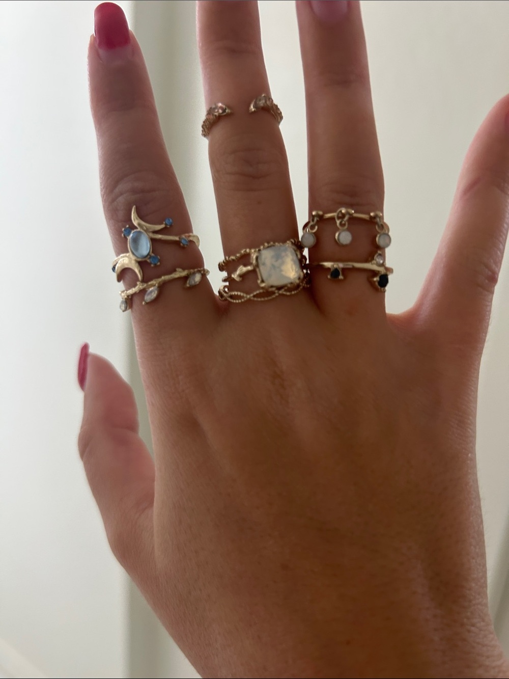 Free People Gold Rings with Blue and White Gem Accents